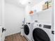 Laundry room with washer, dryer, and shelving for storage at 5323 W Chuck Box Rd, Laveen, AZ 85339