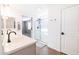 Main bathroom with a large shower, dual vanity, and modern fixtures at 5323 W Chuck Box Rd, Laveen, AZ 85339