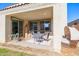 Covered patio with seating area and view of backyard at 5323 W Chuck Box Rd, Laveen, AZ 85339