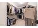 Spacious walk-in closet with ample shelving and hanging space at 5323 W Chuck Box Rd, Laveen, AZ 85339