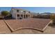 Spacious backyard with gravel and a two-story house at 8912 S 40Th Dr, Laveen, AZ 85339