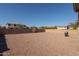 Backyard with gravel and a built-in grill at 8912 S 40Th Dr, Laveen, AZ 85339