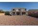 Large backyard with gravel and a two-story house at 8912 S 40Th Dr, Laveen, AZ 85339