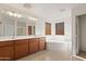 Bathroom boasts a corner bathtub and double vanity at 8912 S 40Th Dr, Laveen, AZ 85339