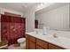 Bathroom with double vanity, shower, and toilet at 8912 S 40Th Dr, Laveen, AZ 85339