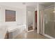 Bathroom features a tub, shower, and toilet at 8912 S 40Th Dr, Laveen, AZ 85339
