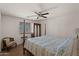 Charming bedroom with wood bed frame and window seating at 8912 S 40Th Dr, Laveen, AZ 85339