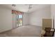 Bedroom with sliding door to balcony at 8912 S 40Th Dr, Laveen, AZ 85339