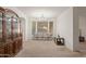 Formal dining room with bay window and a sofa at 8912 S 40Th Dr, Laveen, AZ 85339
