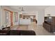 Open dining area with view into kitchen and access to patio at 8912 S 40Th Dr, Laveen, AZ 85339