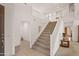 Grand staircase leading to the second floor at 8912 S 40Th Dr, Laveen, AZ 85339