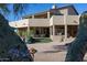 Partially obscured view of home and backyard with gravel at 8945 N Cordoniz Ln, Casa Grande, AZ 85194