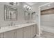 Updated bathroom with double vanity and marble countertop at 9990 N Scottsdale Rd # 1036, Paradise Valley, AZ 85253