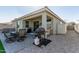 Patio with seating, grill, and hot tub at 10815 S 175Th Dr, Goodyear, AZ 85338