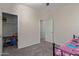 bedroom with Minnie Mouse bedding and closet at 10815 S 175Th Dr, Goodyear, AZ 85338