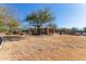 Community park with playground, shaded seating, and grassy areas at 10815 S 175Th Dr, Goodyear, AZ 85338
