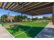 Outdoor basketball court with covered seating at 10815 S 175Th Dr, Goodyear, AZ 85338