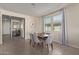 Bright entryway with view of dining area and large clock at 10815 S 175Th Dr, Goodyear, AZ 85338