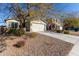 One story house with a two-car garage and gravel driveway at 10815 S 175Th Dr, Goodyear, AZ 85338