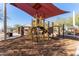 Playground with climbing structures and shade sail at 10815 S 175Th Dr, Goodyear, AZ 85338