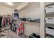 Large walk-in closet with shelving and storage at 10815 S 175Th Dr, Goodyear, AZ 85338