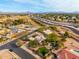 Wide shot of home, pool, and neighborhood at 1103 E Kael Cir, Mesa, AZ 85203