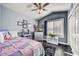 Cozy bedroom with double door closet and wood flooring at 11268 E Poinsettia Dr, Scottsdale, AZ 85259