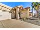 Single story home with two car garage and desert landscaping at 11268 E Poinsettia Dr, Scottsdale, AZ 85259