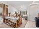 Bright dining area with an open floor plan, seamlessly connecting to the living room and front entrance at 11606 W Laurelwood W Ln, Avondale, AZ 85392