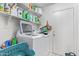 The laundry room is equipped with a washer and dryer at 11606 W Laurelwood Ln, Avondale, AZ 85392