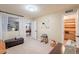 Neutral bedroom with good light, carpet and white walls, with access to storage at 12015 S Tuzigoot Dr, Phoenix, AZ 85044