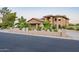 Charming two-story home with a three-car garage, front yard landscaping, and a private facade at 12015 S Tuzigoot Dr, Phoenix, AZ 85044