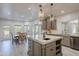 Spacious kitchen area leading to the dining room, featuring a large island at 12015 S Tuzigoot Dr, Phoenix, AZ 85044