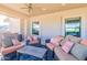 Relaxing outdoor patio area with wicker seating and mountain views in the background at 12015 S Tuzigoot Dr, Phoenix, AZ 85044