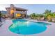 In-ground pool with a baja step, a patio, and desert landscaping for the ultimate relaxation and enjoyment at 12015 S Tuzigoot Dr, Phoenix, AZ 85044