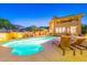 Lovely pool and patio area with lounge chairs, perfect for outdoor entertaining and relaxation at 12015 S Tuzigoot Dr, Phoenix, AZ 85044