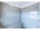 Modern shower with gray tile and built-in bench at 12015 S Tuzigoot Dr, Phoenix, AZ 85044