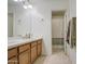 Double vanity bathroom with large mirror and shower at 12226 W Miami St, Tolleson, AZ 85353