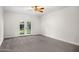 Spacious bedroom with French doors leading to backyard at 12286 N 86Th Pl, Scottsdale, AZ 85260