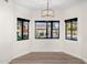 Bright dining room with large windows and view of backyard at 12286 N 86Th Pl, Scottsdale, AZ 85260