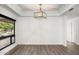 Dining room with hardwood floors and a view of the backyard at 12286 N 86Th Pl, Scottsdale, AZ 85260