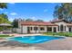 Freeform swimming pool in the backyard, adjacent to the home at 12286 N 86Th Pl, Scottsdale, AZ 85260