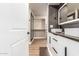 Modern bathroom with double vanity and walk-in shower at 13136 N 20Th Ln, Phoenix, AZ 85029