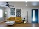 Bright living room with stylish mustard sofa and coffee table at 13136 N 20Th Ln, Phoenix, AZ 85029