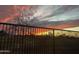 View of the backyard with golf course in the background at 13616 W Sandridge Dr, Sun City West, AZ 85375