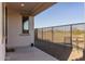 Small backyard with gravel, a metal fence, and a view of a golf course at 13616 W Sandridge Dr, Sun City West, AZ 85375