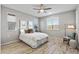 Comfortable bedroom with hardwood floors and natural light at 13616 W Sandridge Dr, Sun City West, AZ 85375
