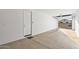 Spacious garage with open view and automatic door at 13616 W Sandridge Dr, Sun City West, AZ 85375