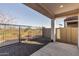 Private backyard patio with seating area and golf course view at 13616 W Sandridge Dr, Sun City West, AZ 85375