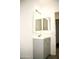 Modern bathroom with gray vanity and double sinks at 13915 N 132Nd Ln, Surprise, AZ 85379